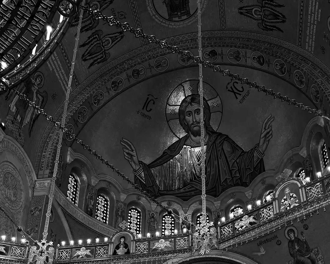 Decorative ceiling with religious icon and intricate patterns